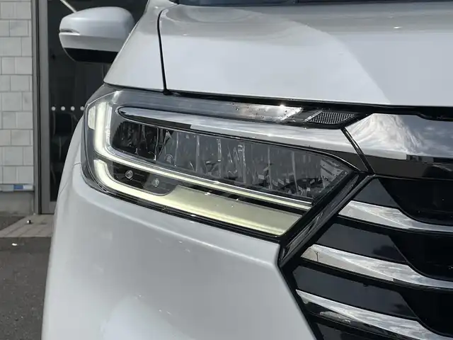 ホンダ オデッセイ アブソルート EX 青森県 2022(令4)年 3.3万km プラチナホワイトパール ４WD/純正ディーラーOPナビ(CD/DVD/BT/フルセグ)/15.6インチリア席モニター/両側パワースライドドア/ジェスチャーコントロールスライドドア/アダプティブクルーズコントロール/レーンキープアシスト/パーキングアシスト/クリアランスソナー/ブラインドスポットモニター/マルチビューモニター（フロント/バック/サイド/全周囲）/ビルトインETC2.0/アイドリングストップ/ECONモード/前席シートヒーター/ハーフレザーシート/革巻きステアリング/ステアリングリモコン/パドルシフト/プッシュスタート/スマートキー/LEDヘッドライト/オートライト/フォグランプ/純正フロアマット/ドアバイザー/18インチアルミホイール/社外AW付冬タイヤ積込/純正エンジンスターター/スペアキー