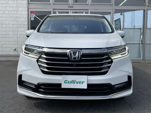 ホンダ オデッセイ アブソルート EX 青森県 2022(令4)年 3.3万km プラチナホワイトパール ４WD/純正ディーラーOPナビ(CD/DVD/BT/フルセグ)/15.6インチリア席モニター/両側パワースライドドア/ジェスチャーコントロールスライドドア/アダプティブクルーズコントロール/レーンキープアシスト/パーキングアシスト/クリアランスソナー/ブラインドスポットモニター/マルチビューモニター（フロント/バック/サイド/全周囲）/ビルトインETC2.0/アイドリングストップ/ECONモード/前席シートヒーター/ハーフレザーシート/革巻きステアリング/ステアリングリモコン/パドルシフト/プッシュスタート/スマートキー/LEDヘッドライト/オートライト/フォグランプ/純正フロアマット/ドアバイザー/18インチアルミホイール/社外AW付冬タイヤ積込/純正エンジンスターター/スペアキー