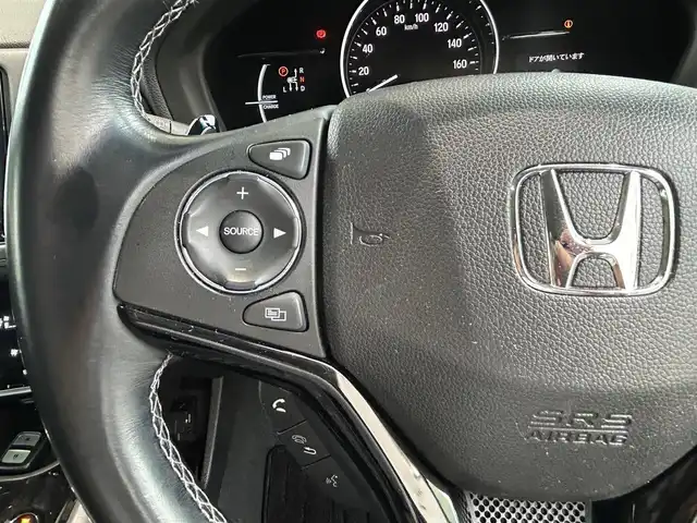 ホンダ ヴェゼル ハイブリッド Z ホンダセンシング 熊本県 2018(平30)年 9.8万km プラチナホワイトパール 4WD/ホンダセンシング/プッシュスタート/純正ナビ/（CD・DVD・フルセグTV・BTオーディオ・SD）/バックカメラ/ビルトインETC/ドライブレコーダー/純正17インチAW/レーダークルーズ/パドルシフト/レザー調シートカバー/前席シートヒーター/LEDヘッドライト/オートライト/LEDフォグライト/横滑り防止装置/ウィンカーミラー/純正フロアマット/純正ドアバイザー/新車保証書/取扱説明書/スマートスペアキー×1本