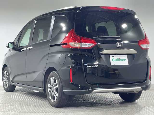 ホンダ フリード クロスター ホンダセンシング 神奈川県 2021(令3)年 2.3万km クリスタルブラックパール ホンダセンシング/社外ナビ/・BT/フルセグTV/CD/DVD/SD/AM/FM/バックカメラ/ハーフレザーシート/両側電動スライドドア/ビルトインETC/アイドリングストップ機能/ヘッドライトレベライザー/革巻きステアリング/ステアリングスイッチ/Autoライト/シートリフター/スマートキー/プッシュスタートボタン/電動格納ミラー/ウィンカーミラー/LEDヘッドライト/フォグランプ/ルーフレール/純正アルミホイール/社外フロアマット