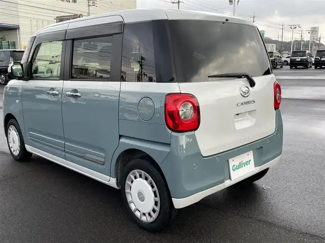 ダイハツ ムーヴ キャンバス ストライプス G 岡山県 2023(令5)年 6.2万km シャイニングホワイトパール/レイクブルーメタリック 登録時走行距離61826km/両側パワースライドドア/レーダークルーズコントロール/衝突回避支援ブレーキ機能/横滑り防止装置/コーナーセンサー/アイドリングストップ/電動パーキングブレーキ/オートブレーキホールド機能/オートライト/オートマチックハイビーム/D/N席シートヒーター/プッシュスタート/スマートキー×2/純正フロアマット/シートカバー