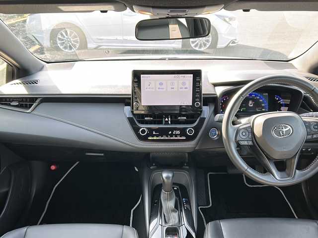 トヨタ カローラツーリング ハイブリッド ダブルバイビー 茨城県 2021(令3)年 2.1万km プラチナホワイトパールマイカ フルタイム４WD/寒冷地仕様/純正ディスプレイオーディオ/Bluetooth/USB接続あり/トヨタセーフティセンス/・プリクラッシュセーフティ/・レーントレーシングアシスト/・レーダークルーズコントロール/・オートマチックハイビーム/・ロードサインアシスト/・先行者発進アラーム/プッシュスタート/スマートキー×2/ビルトインETC/ハーフレザーシート/前席シートヒーター/フロントワイパーデアイサー/ステアリングヒーター/オートライト/LEDヘッドライト/純正17インチAW