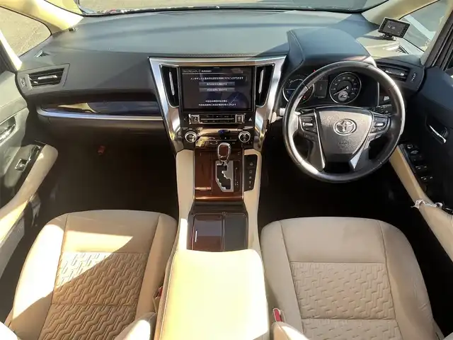 トヨタ ヴェルファイア ハイブリット X 愛媛県 2016(平28)年 6.4万km グレイッシュブルーマイカメタリック アルパイン製ナビ/BT/AM・FM/CD/DVD/フルセグTV/アルパイン製後席モニター/ビルトインETC/ドライブレコーダー/クルーズコントロール/パーキングアシスト/バックカメラ/両側パワースライドドア/8人乗り/オットマン/サンルーフ/純正アルミホイール/純正フロアマット