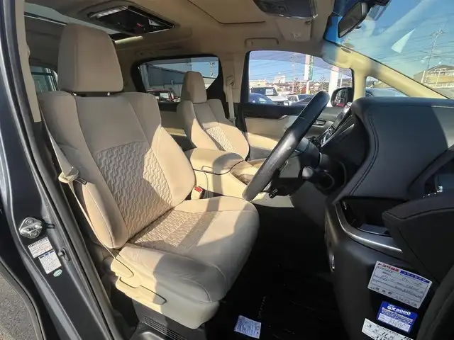 トヨタ ヴェルファイア ハイブリット X 愛媛県 2016(平28)年 6.4万km グレイッシュブルーマイカメタリック アルパイン製ナビ/BT/AM・FM/CD/DVD/フルセグTV/アルパイン製後席モニター/ビルトインETC/ドライブレコーダー/クルーズコントロール/パーキングアシスト/バックカメラ/両側パワースライドドア/8人乗り/オットマン/サンルーフ/純正アルミホイール/純正フロアマット