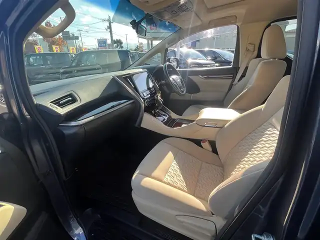 トヨタ ヴェルファイア ハイブリット X 愛媛県 2016(平28)年 6.4万km グレイッシュブルーマイカメタリック アルパイン製ナビ/BT/AM・FM/CD/DVD/フルセグTV/アルパイン製後席モニター/ビルトインETC/ドライブレコーダー/クルーズコントロール/パーキングアシスト/バックカメラ/両側パワースライドドア/8人乗り/オットマン/サンルーフ/純正アルミホイール/純正フロアマット