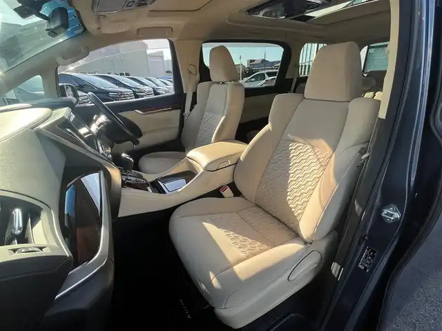 トヨタ ヴェルファイア ハイブリット X 愛媛県 2016(平28)年 6.4万km グレイッシュブルーマイカメタリック アルパイン製ナビ/BT/AM・FM/CD/DVD/フルセグTV/アルパイン製後席モニター/ビルトインETC/ドライブレコーダー/クルーズコントロール/パーキングアシスト/バックカメラ/両側パワースライドドア/8人乗り/オットマン/サンルーフ/純正アルミホイール/純正フロアマット