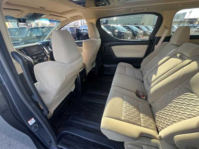 トヨタ ヴェルファイア ハイブリット X 愛媛県 2016(平28)年 6.4万km グレイッシュブルーマイカメタリック アルパイン製ナビ/BT/AM・FM/CD/DVD/フルセグTV/アルパイン製後席モニター/ビルトインETC/ドライブレコーダー/クルーズコントロール/パーキングアシスト/バックカメラ/両側パワースライドドア/8人乗り/オットマン/サンルーフ/純正アルミホイール/純正フロアマット