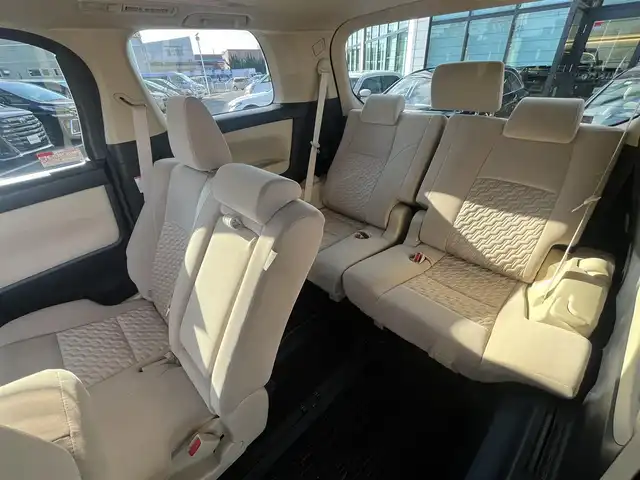 トヨタ ヴェルファイア ハイブリット X 愛媛県 2016(平28)年 6.4万km グレイッシュブルーマイカメタリック アルパイン製ナビ/BT/AM・FM/CD/DVD/フルセグTV/アルパイン製後席モニター/ビルトインETC/ドライブレコーダー/クルーズコントロール/パーキングアシスト/バックカメラ/両側パワースライドドア/8人乗り/オットマン/サンルーフ/純正アルミホイール/純正フロアマット