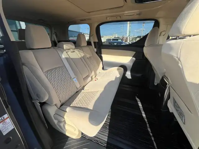 トヨタ ヴェルファイア ハイブリット X 愛媛県 2016(平28)年 6.4万km グレイッシュブルーマイカメタリック アルパイン製ナビ/BT/AM・FM/CD/DVD/フルセグTV/アルパイン製後席モニター/ビルトインETC/ドライブレコーダー/クルーズコントロール/パーキングアシスト/バックカメラ/両側パワースライドドア/8人乗り/オットマン/サンルーフ/純正アルミホイール/純正フロアマット