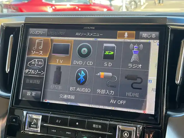 トヨタ ヴェルファイア ハイブリット X 愛媛県 2016(平28)年 6.4万km グレイッシュブルーマイカメタリック アルパイン製ナビ/BT/AM・FM/CD/DVD/フルセグTV/アルパイン製後席モニター/ビルトインETC/ドライブレコーダー/クルーズコントロール/パーキングアシスト/バックカメラ/両側パワースライドドア/8人乗り/オットマン/サンルーフ/純正アルミホイール/純正フロアマット