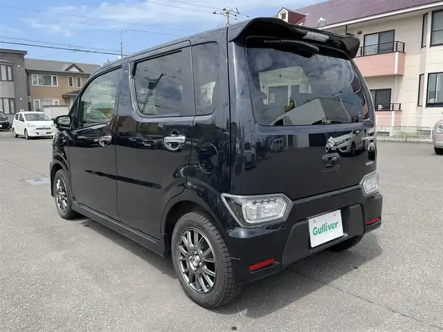 スズキ ワゴンＲ スティングレー HYBRID T 道央・札幌 2017(平29)年 10.8万km ブルーイッシュブラックパール3 登録時走行距離107772ｋｍ/　４　Ｗ　Ｄ　/寒冷地仕様/ターボ車/純正メモリナビ（CD/DVD/FM/AM/BT/USB)/フルセグ(走行中視聴可)/バックカメラ/全周囲カメラ/アイドリングストップ/ウィンカーミラー/クルーズコントロール（追従走行なし）/プッシュスタート/MTモード付AT/パドルシフト/ベンチシート/純正フロアマット/シートヒーター（運転席/助手席）/横滑り防止装置/レーンキープアシスト/盗難防止装置/オートライト/オートマチックハイビーム/衝突軽減ブレーキ/フォグランプ/ステアリングスイッチ/革巻きステアリング/イルミネーションコントロール/ヘッドアップディスプレイ/電動格納ミラー/積込夏タイヤ（純正AW/165/55/R15/21年製/溝4ｍｍ）