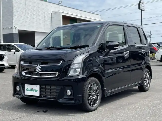 スズキ ワゴンＲ スティングレー HYBRID T 道央・札幌 2017(平29)年 10.8万km ブルーイッシュブラックパール3 登録時走行距離107772ｋｍ/　４　Ｗ　Ｄ　/寒冷地仕様/ターボ車/純正メモリナビ（CD/DVD/FM/AM/BT/USB)/フルセグ(走行中視聴可)/バックカメラ/全周囲カメラ/アイドリングストップ/ウィンカーミラー/クルーズコントロール（追従走行なし）/プッシュスタート/MTモード付AT/パドルシフト/ベンチシート/純正フロアマット/シートヒーター（運転席/助手席）/横滑り防止装置/レーンキープアシスト/盗難防止装置/オートライト/オートマチックハイビーム/衝突軽減ブレーキ/フォグランプ/ステアリングスイッチ/革巻きステアリング/イルミネーションコントロール/ヘッドアップディスプレイ/電動格納ミラー/積込夏タイヤ（純正AW/165/55/R15/21年製/溝4ｍｍ）