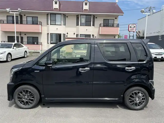 スズキ ワゴンＲ スティングレー HYBRID T 道央・札幌 2017(平29)年 10.8万km ブルーイッシュブラックパール3 登録時走行距離107772ｋｍ/　４　Ｗ　Ｄ　/寒冷地仕様/ターボ車/純正メモリナビ（CD/DVD/FM/AM/BT/USB)/フルセグ(走行中視聴可)/バックカメラ/全周囲カメラ/アイドリングストップ/ウィンカーミラー/クルーズコントロール（追従走行なし）/プッシュスタート/MTモード付AT/パドルシフト/ベンチシート/純正フロアマット/シートヒーター（運転席/助手席）/横滑り防止装置/レーンキープアシスト/盗難防止装置/オートライト/オートマチックハイビーム/衝突軽減ブレーキ/フォグランプ/ステアリングスイッチ/革巻きステアリング/イルミネーションコントロール/ヘッドアップディスプレイ/電動格納ミラー/積込夏タイヤ（純正AW/165/55/R15/21年製/溝4ｍｍ）