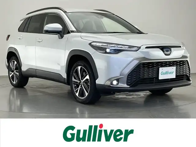 トヨタ カローラ クロス ハイブリッド Z 愛知県 2023(令5)年 1.8万km プラチナホワイトパールマイカ 純正８型ＤＡ　全方位カメラ　ＢＳＭ　禁煙車　セーフティセンス　衝突軽減　追従クルコン　ＬＥＤオートライト　黒ハーフレザー　シートヒーター　電動リヤゲート　レーンキープ　スペアタイヤ　プッシュスタート　スマートキー　電子パーキング　ブレーキホールド　カーテンエアバッグ　純正アルミホイール　純正フロアマット　USBポート　Bluetooth