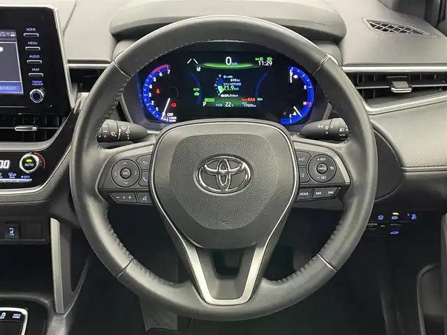 トヨタ カローラ クロス ハイブリッド Z 愛知県 2023(令5)年 1.8万km プラチナホワイトパールマイカ 純正８型ＤＡ　全方位カメラ　ＢＳＭ　禁煙車　セーフティセンス　衝突軽減　追従クルコン　ＬＥＤオートライト　黒ハーフレザー　シートヒーター　電動リヤゲート　レーンキープ　スペアタイヤ　プッシュスタート　スマートキー　電子パーキング　ブレーキホールド　カーテンエアバッグ　純正アルミホイール　純正フロアマット　USBポート　Bluetooth