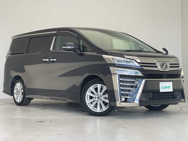 トヨタ ヴェルファイア Z 愛知県 2018(平30)年 4.8万km スパークリングブラックパールクリスタルシャイン 純正SDナビ/フリップダウンモニター/両側パワースライドドア/レーダークルーズコントロール/フルセグテレビ/Bluetooth/バックカメラ/コーナーセンサー/純正アルミホイール/LEDヘッドライト/リアAC/オートマチックハイビーム/ドライブレコーダー/ビルトインETC/衝突軽減ブレーキ/ステアリングスイッチ/スマートキー/プッシュスタート/オットマン/純正フロアマット/後席モニター
