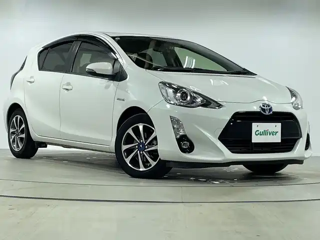 トヨタ アクア 神奈川県 2015(平27)年 5.7万km ライムホワイトパールクリスタルシャイン 純正ナビ【NSCP-W64】/AM　FM　ワンセグ　CD　SD　Bluetooth/ビルトインETC/バックカメラ/フロントドライブレコーダー/革巻ステアリング/ステアリングリモコン/クルーズコントロール/横滑り防止装置/ナビレディパッケージ/EV MODE/ECO MODE/電動格納ミラー/EVMODE/ISOFIX対応/フロアマット/モデリスタ15インチAW/ドアバイザー/スマートキー×2