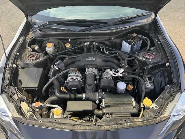 トヨタ ８６ GT リミテッド 栃木県 2013(平25)年 6.1万km ダークグレーメタリック TRDスポイラー(F/S/R)/TRDマフラー/車高調/WedsSport19インチAW/6速MT/純正メモリナビ/TV/Bluetooth/AM/FM/CD/HIDヘッドライト/フォグランプ/オートライト/スマートキー/スペアキー/プッシュEgスタート/ハーフレザーシート/シートヒーター/純正フロアマット/サイド/カーテンエアバッグ/保証書/取説