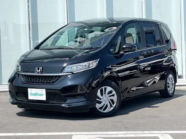 ホンダ フリード G ホンダセンシング 神奈川県 2020(令2)年 2.1万km クリスタルブラックパール 純正９型ＳＤナビ/ワンセグ/Apple car Play/iPod/両側パワースライドドア/バックカメラ/追従走行付きクルーズコントロール/ビルトインＥＴＣ/ＵＳＢポート/ウォークスルー/レーンアシスト/ＡＢＳ/横滑り防止装置/盗難防止装置/衝突被害軽減システム