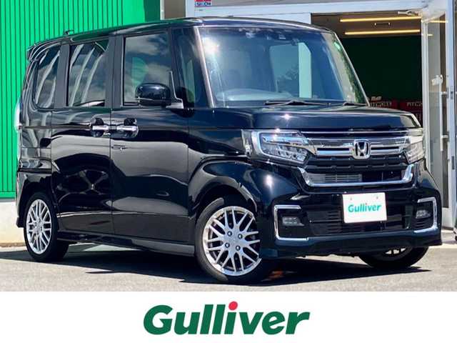 ホンダ Ｎ ＢＯＸ カスタム L ターボ 静岡県 2021(令3)年 3.8万km クリスタルブラックパール エンジンスタートボタン/取扱説明書/パワーステアリング/パワーウィンドウ/パドルシフト/アイドリングストップ/スマートキー/スペアキー1本/オートエアコン/クルーズコントロール/USB入力端子/純正ETC2.0/バックカメラ/純正ナビ（CD/DVD/BT/フルセグ）/純正ドライブレコーダー前後/ベンチシート/純正フロアマット/ハーフレザーシート/D席N席シートヒーター/両側パワースライドドア/純正アルミホイール/ABS/横滑り防止装置/コーナーセンサー/レーンキープアシスト/盗難防止装置/オートライト/オートマチックハイビーム/LEDヘッドライト/W+サイドエアバック/衝突軽減システム/カーテンエアバック/ホンダセンシング/電動パーキングブレーキ