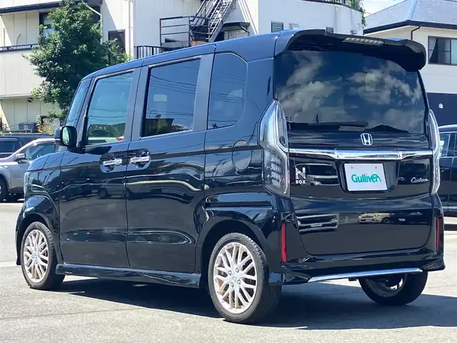 ホンダ Ｎ ＢＯＸ カスタム L ターボ 静岡県 2021(令3)年 3.8万km クリスタルブラックパール エンジンスタートボタン/取扱説明書/パワーステアリング/パワーウィンドウ/パドルシフト/アイドリングストップ/スマートキー/スペアキー1本/オートエアコン/クルーズコントロール/USB入力端子/純正ETC2.0/バックカメラ/純正ナビ（CD/DVD/BT/フルセグ）/純正ドライブレコーダー前後/ベンチシート/純正フロアマット/ハーフレザーシート/D席N席シートヒーター/両側パワースライドドア/純正アルミホイール/ABS/横滑り防止装置/コーナーセンサー/レーンキープアシスト/盗難防止装置/オートライト/オートマチックハイビーム/LEDヘッドライト/W+サイドエアバック/衝突軽減システム/カーテンエアバック/ホンダセンシング/電動パーキングブレーキ