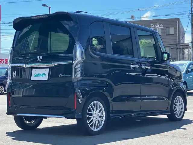 ホンダ Ｎ ＢＯＸ カスタム L ターボ 静岡県 2021(令3)年 3.8万km クリスタルブラックパール エンジンスタートボタン/取扱説明書/パワーステアリング/パワーウィンドウ/パドルシフト/アイドリングストップ/スマートキー/スペアキー1本/オートエアコン/クルーズコントロール/USB入力端子/純正ETC2.0/バックカメラ/純正ナビ（CD/DVD/BT/フルセグ）/純正ドライブレコーダー前後/ベンチシート/純正フロアマット/ハーフレザーシート/D席N席シートヒーター/両側パワースライドドア/純正アルミホイール/ABS/横滑り防止装置/コーナーセンサー/レーンキープアシスト/盗難防止装置/オートライト/オートマチックハイビーム/LEDヘッドライト/W+サイドエアバック/衝突軽減システム/カーテンエアバック/ホンダセンシング/電動パーキングブレーキ