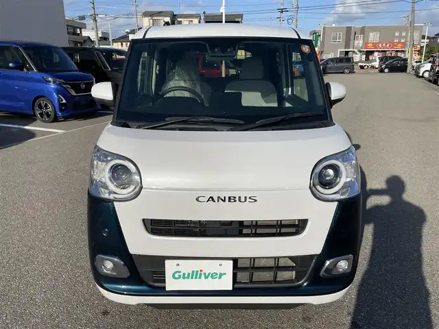 ダイハツ ムーヴ キャンバス ストライプス G 石川県 2023(令5)年 2.7万km シャイニングホワイトパール/レーザーブルークリスタルシャイン 純正メモリーナビ/純正CD/DVD/フルセグTV/バックカメラ/LEDヘッドライト/両側パワースライドドア/ETC/スマートアシスト/オートブレーキホールド/コーナーセンサー/スマートキー/プッシュスタート/電動ミラー/保証書
