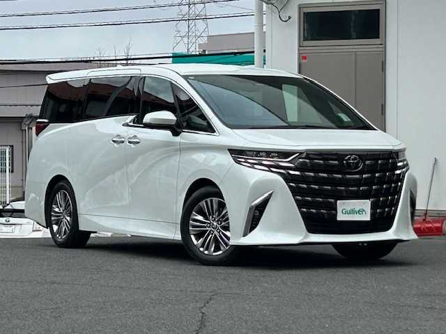 トヨタ アルファード Z 宮城県 2023(令5)年 1.8万km プラチナホワイトパールマイカ ワンオーナー/左右独立ムーンルーフ/デジタルインナーミラー/14インチメモリーナビ/Bluetooth・フルセグTV・AM・FM・USB/純正フリップダウンモニター/パノラミックビューモニター/パワーバックドア/トヨタセーフティセンス/・プリクラッシュセーフティ/・レーントレーシングアシスト/・レーンディパーチャーアラート/・レーダークルーズコントロール/・アダプティブハイビームシステム/・ロードサインアシスト/・ドライバー異常時対応システム/・プロアクティブドライビングアシスト/・発進遅れ告知機能/クルーズコントロール/両側電動パワースライドドア/オートライト/オートマチックハイビーム/フロントフォグライト/運転席／助手席パワーシート/前席・2列目シートヒーター・ベンチレーターシート/セカンドシートオットマン付き/ステアリングヒーター/電動サイドサンシェード/ビルトインETC/純正18インチAW/置くだけ充電/純正フロアマット/保証書/スペアスマートキー