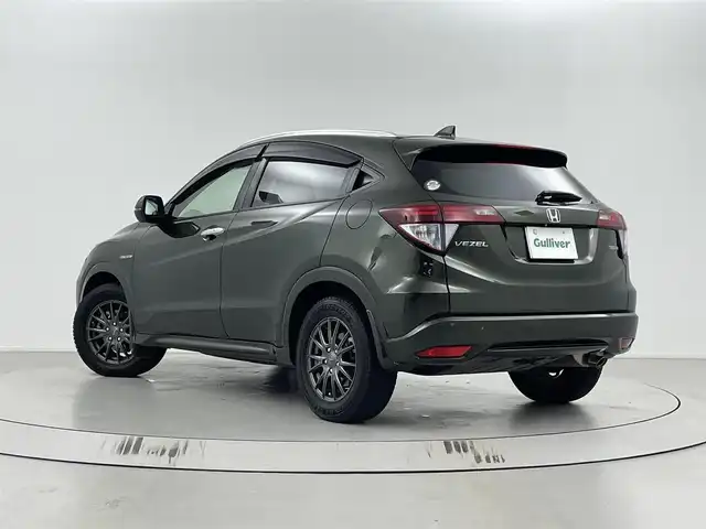ホンダ ヴェゼル ハイブリッド Z 埼玉県 2015(平27)年 10.1万km ミスティックグリーンパール シティブレーキアクティブシステム/純正８インチナビゲーションVXM-155VFEi/（フルセグTV/CD/DVD/Bluetooth/HDMI入力/SD/AM/FM）/バックカメラ/クルーズコントロール/パドルシフト/前後ドライブレコーダー/ETC/ハーフレザーシート /シートヒーター /電動パーキングブレーキ/ブレーキホールド/スマートキー/プッシュスタート/オートLEDヘッドライト/純正アルミサマータイヤ有