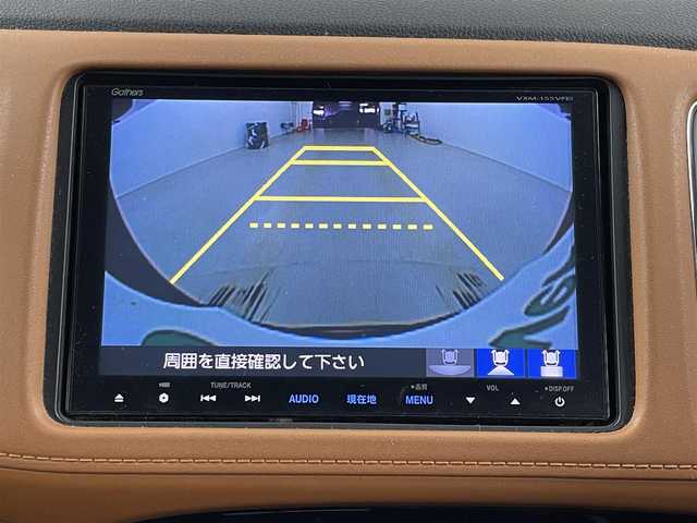 ホンダ ヴェゼル ハイブリッド Z 埼玉県 2015(平27)年 10.1万km ミスティックグリーンパール シティブレーキアクティブシステム/純正８インチナビゲーションVXM-155VFEi/（フルセグTV/CD/DVD/Bluetooth/HDMI入力/SD/AM/FM）/バックカメラ/クルーズコントロール/パドルシフト/前後ドライブレコーダー/ETC/ハーフレザーシート /シートヒーター /電動パーキングブレーキ/ブレーキホールド/スマートキー/プッシュスタート/オートLEDヘッドライト/純正アルミサマータイヤ有