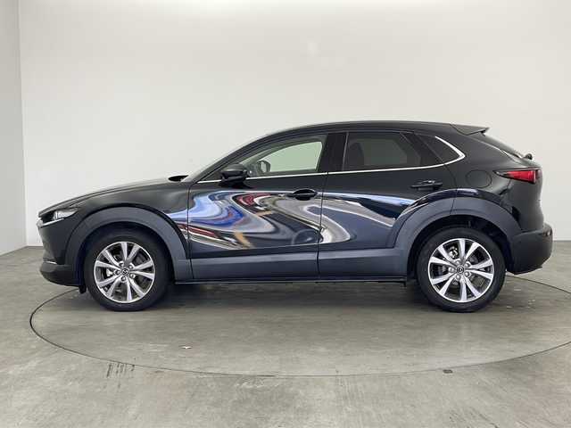 マツダ ＣＸ－３０ 20S プロアクティブツーリングセレ 兵庫県 2020(令2)年 2.9万km ジェットブラックマイカ ・純正10.25インチナビ&Bluetooth接続&CD/DVD&USB&TV/・アラウンドビューモニター/・ビルドインETC/・レーダークルーズコントロール/・i-ACTIVSENSE/・ブラインドスポットモニター/・ABS/・横滑り防止機能/・前後コーナーセンサー/・盗難防止装置/・オートライト/・オートマチックハイビーム/・LEDヘッドライト/・W＋サイドエアバック/・カーテンエアバック/・パワーバックドア/・純正フロアマット/・メモリーパワーシート（運転席）/・シートヒーター（運転席・助手席）/・純正18インチアルミホイール/・革巻きステアリング/・ステアリングスイッチ/・ステアリングヒーター/・電動パーキングブレーキ/・オートブレーキホールド