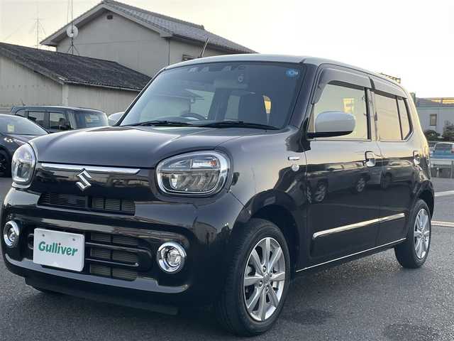 スズキ アルト ハイブリッドX 広島県 2022(令4)年 2.3万km アーバンブラウンパールメタリック 2トーン ワンオーナー/純正ナビ/　【CD/DVD/BT/フルセグTV】/衝突被害軽減ブレーキ/車線逸脱警報/車線逸脱警制御/横滑り防止/ETC/オートライト/純正LEDライト/フォグランプ/スマートキー/プッシュスタート/アイドリングストップ/純正アルミホイール 14インチ/ドアバイザー/ウインカーミラー/純正フロアマット/新車時整備手帳（保証書）/取扱説明書