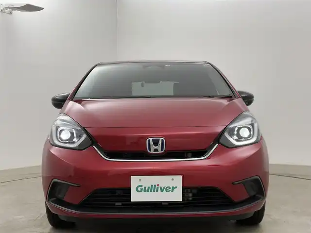 ホンダ フィット e:HEVホーム カーサ 岡山県 2022(令4)年 5.5万km プレミアムクリスタルレッドM 純正８インチナビ　衝突軽減ブレーキ　レーダークルーズコントロール　シートヒーター　ビルトインＥＴＣ　ＬＥＤヘッドライト　バックカメラ　Ｂｌｕｅｔｏｏｔｈ　フルセグＴＶ　ドライブレコーダー　ＵＳＢ接続