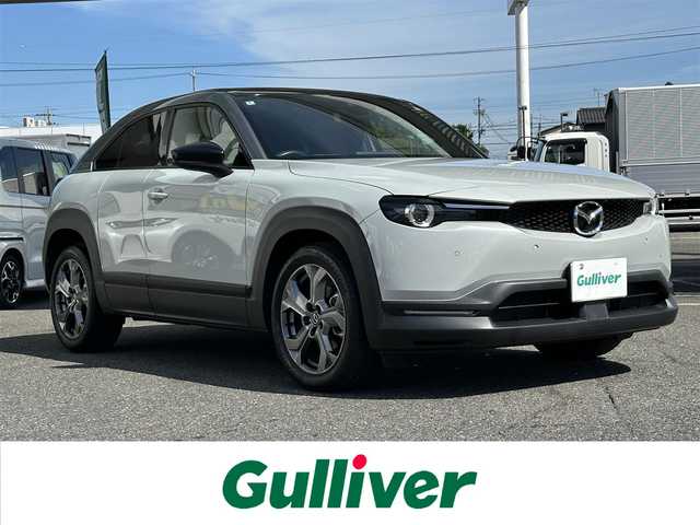 マツダ ＭＸ－３０ 愛知県 2022(令4)年 3.5万km セラミックメタリック ワンオーナー/メモリナビ/フルセグテレビ/全方位カメラ/バックカメラ/アイドリングストップ/ウィンカーミラー/レーダークルーズコントロール/プッシュスタート/ビルトインETC/ヘッドアップディスプレイ/ブラインドスポットモニター/前後ドライブレコーダー/パワーシート/シートヒーター/前後クリアランスソナー/オートマチックハイビーム/ステアリングヒーター/ステアリングスイッチ/シートメモリー/トラクションコントロールオフスイッチ/iACTIVESENSE/スマートキー2本/保証書/取扱説明書