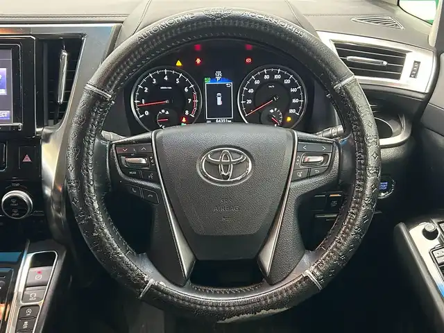 トヨタ ヴェルファイア Z 鹿児島県 2015(平27)年 6.5万km ホワイトパールクリスタルシャイン 禁煙車/純正9インチSDナビ(NSZT-Y64T)/　・Bluetooth/　・CD/DVD/　・フルセグTV/　・AM/FM/フリップダウンモニター/両側パワースライドドア/バックカメラ/ETC/電動パーキングブレーキ/ブレーキホールド/前後コーナーセンサー/後席オットマン/純正フロアマット/社外アルミホイール(huperion)/電動格納ミラー/ステアリングリモコン/全席オートパワーウィンドウ