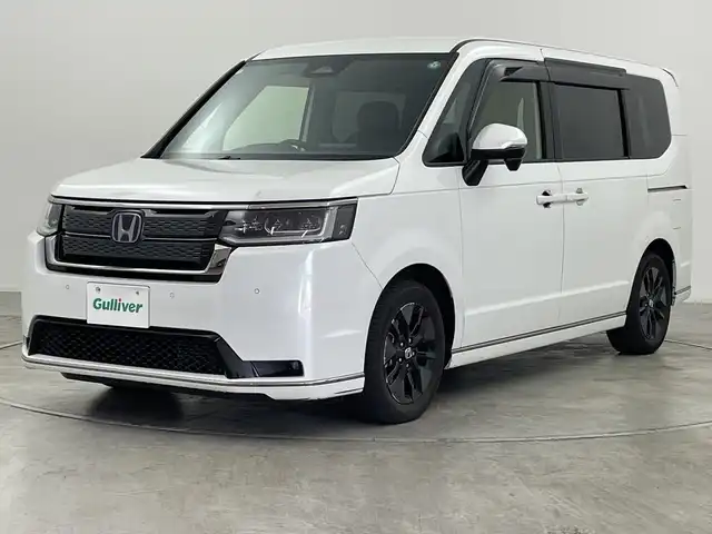 ホンダ ステップワゴン スパーダ eHEV 群馬県 2023(令5)年 3.6万km プラチナホワイトパール 純正９型ナビ　バックカメラ　アダプティブクルーズコントロール　ブラインドスポットモニター　レーンキープアシスト　衝突被害軽減ブレーキ　シートヒーター　パワーバックドア　コーナーセンサー　ＬＥＤ　禁煙車