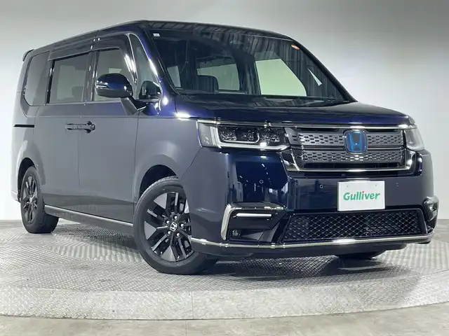 ホンダ ステップワゴン スパーダ eHEV 神奈川県 2023(令5)年 2.4万km ミッドナイトブルービームM ホンダセンシング/アダブティブクルーズコントロール/CMBS衝突軽減ブレーキ/誤発進抑制機能/LKAS車線維持支援システム/標識認識機能/先行車発進お知らせ機能/歩行者事故低減ステアリング/路外逸脱抑制機能/純正11.4型ナビ/・BT/フルセグTV/SD/USB/CD/DVD/バックカメラ/BSM/両側電動ドア/ハーフレザーシート/シートヒーター(D/N)/ETC/電動サイドブレーキ/オートブレーキホールド/ECON/革巻きステアリング/ステアリングスイッチ/パドルシフト/Autoライト/パワーバックドア/スマートキー/プッシュスタートボタン/ヘッドライトレベライザー/LEDヘッドライト/フォグランプ/電動格納ミラー/ウィンカーミラー/SOSコール/オットマン/純正16インチアルミホイール/純正ドアバイザー