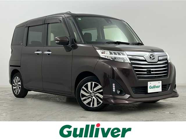 ダイハツ トール カスタムG SAⅡ 宮城県 2017(平29)年 5.2万km プラムブラウンクリスタルマイカ 禁煙車/フリップダウンモニター/スマートアシストIII/・衝突回避支援/・車線逸脱警報/・先行車発進お知らせ/両側パワースライドドア/クルーズコントロール/純正7インチナビ/地図SD無し/（BT.AM.FM.CD.DVD.SD）/アラウンドビューモニター/フルセグテレビ/ビルトインETC/革巻きステアリング/ステアリングスイッチ/プッシュスタート/スマートキー/ロールサンシェード/純正フロアマット/純正ドアバイザー/LEDヘッドライト/LEDフォグランプ/純正14インチアルミホイール/横滑り防止機能/アイドリングストップ/コーナーセンサー