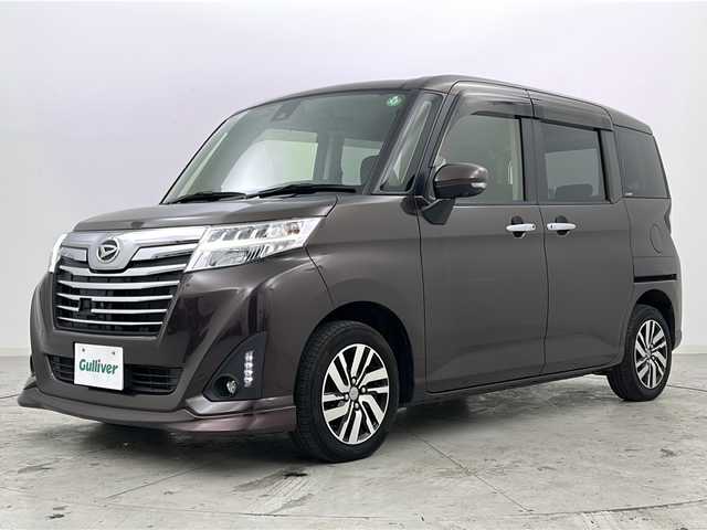 ダイハツ トール カスタムG SAⅡ 宮城県 2017(平29)年 5.2万km プラムブラウンクリスタルマイカ 禁煙車/フリップダウンモニター/スマートアシストIII/・衝突回避支援/・車線逸脱警報/・先行車発進お知らせ/両側パワースライドドア/クルーズコントロール/純正7インチナビ/地図SD無し/（BT.AM.FM.CD.DVD.SD）/アラウンドビューモニター/フルセグテレビ/ビルトインETC/革巻きステアリング/ステアリングスイッチ/プッシュスタート/スマートキー/ロールサンシェード/純正フロアマット/純正ドアバイザー/LEDヘッドライト/LEDフォグランプ/純正14インチアルミホイール/横滑り防止機能/アイドリングストップ/コーナーセンサー