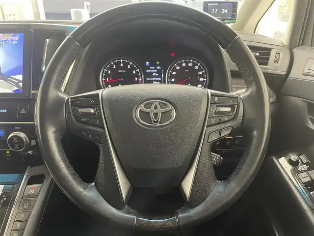 トヨタ アルファード SC 滋賀県 2018(平30)年 17.4万km ホワイトパールクリスタルシャイン 禁煙車/純正10インチナビ/(フルセグTV/Bluetooth/CD/DVD/SD)/純正フリップダウンモニター/サンルーフ/両側パワースライドドア/レーダークルーズコントロール/クリアランスソナー/レーントレーシングアシスト/シートメモリー機能付き/電動リアゲート/ウッドコンビステアリング/社外１８インチスタッドレス/ステアリングリモコン/ハンドルヒーター/シートヒーター(D/N)/シートベンチレーション(D/N)/オートライト/オートハイビーム/ビルトインETC/アイドリングストップ/前方ドラレコ/デジタルインナーミラー/ワイヤレス充電/１００V電源/プッシュスタート/ドアバイザー/オートリトラミラー/スマートキー