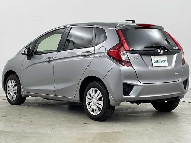 ホンダ フィット 13G Fパッケージ 道央・札幌 2015(平27)年 2.8万km ティンテッドシルバーM ・4WD/・ワンオーナー/・純正ナビ＆TV&CD&DVD&BT&SD/・バックカメラ/・衝突軽減ブレーキ/・純正ドライブレコーダー/・純正エンジンスターター/・鉄チン付きサマータイヤ積込/・フロントワイパーデアイサー/・ビルトインETC/・スマートキー/・スペアキー/・アイドリングストップ/・横滑り防止