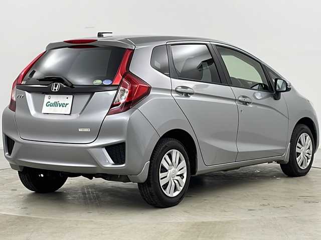 ホンダ フィット 13G Fパッケージ 道央・札幌 2015(平27)年 2.8万km ティンテッドシルバーM ・4WD/・ワンオーナー/・純正ナビ＆TV&CD&DVD&BT&SD/・バックカメラ/・衝突軽減ブレーキ/・純正ドライブレコーダー/・純正エンジンスターター/・鉄チン付きサマータイヤ積込/・フロントワイパーデアイサー/・ビルトインETC/・スマートキー/・スペアキー/・アイドリングストップ/・横滑り防止