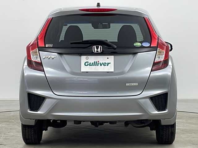 ホンダ フィット 13G Fパッケージ 道央・札幌 2015(平27)年 2.8万km ティンテッドシルバーM ・4WD/・ワンオーナー/・純正ナビ＆TV&CD&DVD&BT&SD/・バックカメラ/・衝突軽減ブレーキ/・純正ドライブレコーダー/・純正エンジンスターター/・鉄チン付きサマータイヤ積込/・フロントワイパーデアイサー/・ビルトインETC/・スマートキー/・スペアキー/・アイドリングストップ/・横滑り防止
