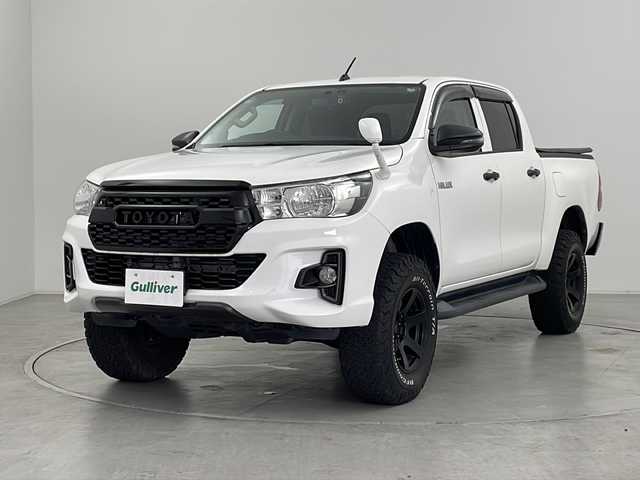 トヨタ ハイラックス X 群馬県 2019(平31)年 7.6万km スーパーホワイトⅡ ＪＡＯＳ車高調　ＪＡＯＳマフラー　三つ折りソフトトノカバー　ヒッチメンバー　社外１６インチアルミホイール　ナビ　バックカメラ　前後ドラレコ　ＥＴＣ　ステアリングスイッチ　ＬＥＤライト　フォグ　禁煙車