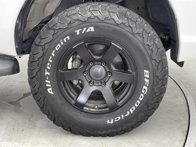 トヨタ ハイラックス X 群馬県 2019(平31)年 7.6万km スーパーホワイトⅡ ＪＡＯＳ車高調　ＪＡＯＳマフラー　三つ折りソフトトノカバー　ヒッチメンバー　社外１６インチアルミホイール　ナビ　バックカメラ　前後ドラレコ　ＥＴＣ　ステアリングスイッチ　ＬＥＤライト　フォグ　禁煙車