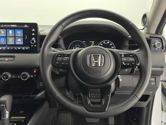 ホンダ ヴェゼル ハイブリッド e:HEV Z 長野県 2024(令6)年 2.2万km プラチナホワイトパール 4WD/純正ナビ/寒冷地仕様/ホンダセンシング/全方位カメラ/バックカメラ/追従型クルーズコントロール/ドライブレコーダー/フルセグTV/Bluetooth/USB/ビルトインETC2.0/AppleCarPlay/AndroidAuto/シートヒーター（運転席、助手席）/オートライト/LEDヘッドライト/オートマチックハイビーム/ステアリングスイッチ/ステアリングヒーター/電動リアゲート/パドルシフト/ワイパーデアイサー/置くだけ充電/純正フロアマット/純正アルミホイール/電動格納ミラー/ドアバイザー