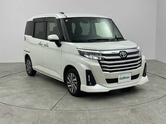 トヨタ ルーミー カスタムG 愛知県 2021(令3)年 2.4万km パールホワイトⅢ スマートアシスト/　　・衝突警報機能/　　・衝突回避支援ブレーキ機能/　　・先行車発進お知らせ機能/　　・標識認識機能/　　・車線逸脱警報機能/　　・路側逸脱警報/　　・ふらつき警報/　　・アダプティブドライビングビーム/　　・アダプティブクルーズコントロール/　　・サイドビューランプ/　　・パノラミックビューモニター/純正9インチナビ/　　・CD/DVD/フルセグ/BT/ドライブレコーダー/ビルトインETC/ステアリングリモコン/シートヒーター（前席）/オートエアコン/両側パワースライドドア/純正LEDヘッドライト/フォグランプ/電動格納ウィンカーミラー/取扱説明書/保証書/スペアキー