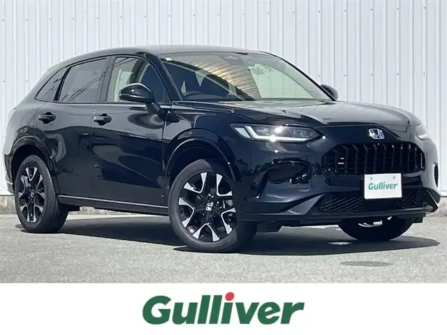 ホンダ ＺＲ－Ｖ ハイブリッド e:HEV Z 福岡県 2025(令7)年 0.1万km クリスタルブラックパール ホンダセンシング/衝突軽減/レーンアシスト/コーナーセンサー/ＢＯＳＥサウンド/レザーシート/純正ナビ/フルセグTV/BT/applecarplay/androidauto/全周囲カメラ/ＢＳＩ/ハンズフリーパワーバックドア/ＡＣＣ/ステアリングヒーター/前席/後席シートヒーター/前席パワーシート/シートメモリー/ダウンヒルアシストコントロール/ワイヤレス充電/ビルトインETC2.0/パドルシフト/電動パーキング/ブレーキホールド/スマートキー/プッシュスタート