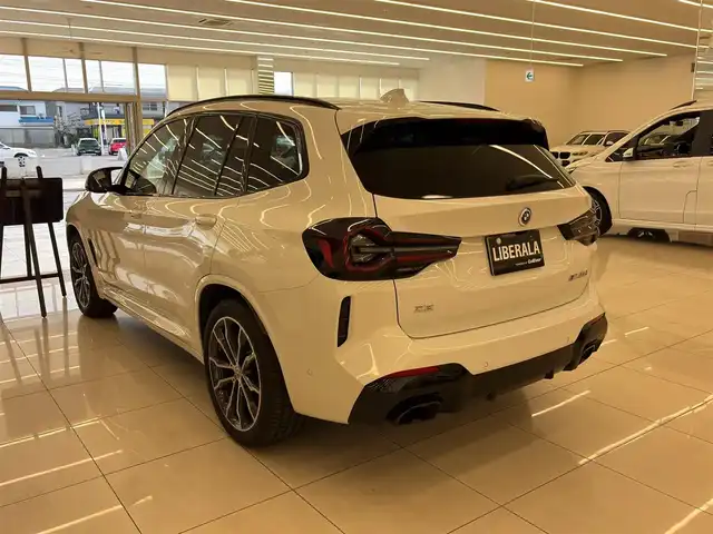 ＢＭＷ Ｘ３ M40d 岡山県 2022(令4)年 3.2万km アルピンホワイトⅢ セレクトパッケージ/・パノラマガラスサンルーフ/・harman/kardonサラウンドサウンドシステム/・シートヒーター（ALL）/・ヘッドアップディスプレイ/・ジェスチャーコントロール/・サンプロテクションガラス/・リアサイドウインドローラーブラインド/・HUD/ACC/本革シート（ブラウン）/ステアリングヒーター/全周囲カメラ/iDrive7/アップルカープレイ/フルセグTV/ドラレコ/ヒルディセントコントロール/SOSコール/正面衝突警告/側面衝突警告/車線逸脱警告/車線変更警告/ブラックキドニーグリル/Mスポーツキャリパー（RED）