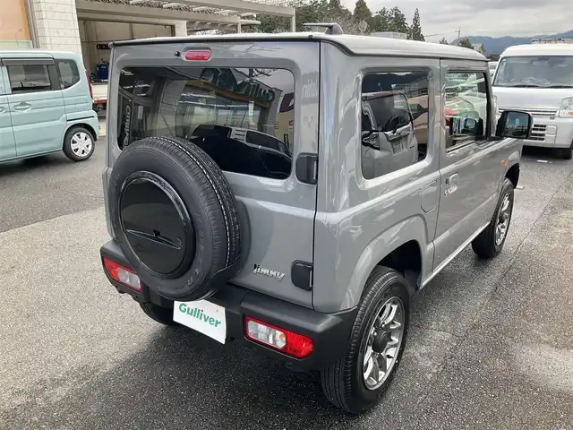 スズキ ジムニー XC 滋賀県 2025(令7)年 0.2万km ミディアムグレー ワンオーナー /車検令和10年2月まで/パートタイム4WD/純正16インチアルミホイール/スズキセーフティサポート/純正LEDヘッドライト/・フォグランプ/純正フロアマット/前席シートヒーター/ステアリングリモコン/・オーディオ操作用/・クルーズコントロール/スペアキー/背面スペアタイヤ/取扱説明書/保証書/